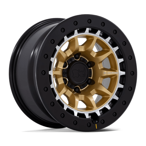 https://assets.wheelpros.com/transform/b40f15f2-3612-4d2d-8204-20fcedde1cb5/BLACK-RHINO-BR016-TUSK-17X8-5-6-ET-10-MATTE-GOLD-W-MACHINE-A1-png?size=500