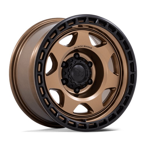 https://assets.wheelpros.com/transform/f19ca205-f69b-4bc8-acc7-d329aa7f7ea4/BLACK-RHINO-BR018ZB-VOYAGER-17X8-5-6-ET-10-MATTE-BRONZE-W-BLACK-LIP-A1-png?size=500