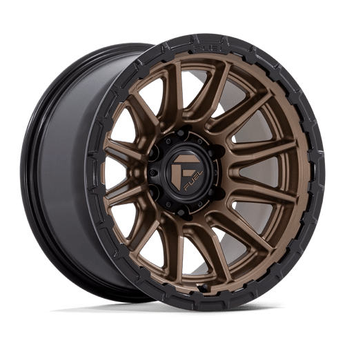 https://assets.wheelpros.com/transform/4834ba66-dac4-4706-8084-66343f7f42d9/FUEL-FC866ZB-PISTON-17X9-6-ET-12-MATTE-BRONZE-W-GLOSS-BLACK-LIP-A1-png?size=500