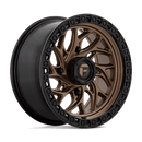 https://assets.wheelpros.com/transform/4fa8c7c6-311e-4b0d-a7f1-d47d18b5b143/FUEL-RUNNER-UTV-15X7-4LUG-ET10-MATTE-BRONZE-W-BLACK-RING-A1-png?size=500