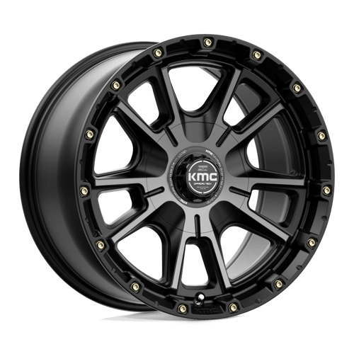 https://assets.wheelpros.com/transform/4d6e7b5a-fde9-4c6d-bdab-b0e6917d2240/KM100-17X9-ET18-Black-Gray-Tint_A1-png?size=500