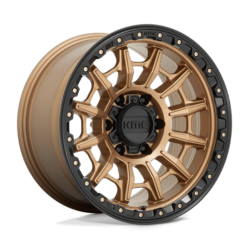 https://assets.wheelpros.com/transform/d9639908-3ee0-471a-b537-58f3205a4e60/KM5476-6LUG-17x9-ET-12-MATTE-BRONZE-W-BLK-LIP-A1-png?size=500