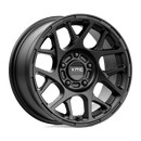 https://assets.wheelpros.com/transform/0ec8c45c-6441-46d8-8ede-55da99b855a6/KM708-15X7-ET10-Black_A1-png?size=500