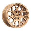 https://assets.wheelpros.com/transform/fb886e86-274b-4653-b34b-e74b0e7dd815/KM708-15X7-ET10-Bronze_A1-png?size=500