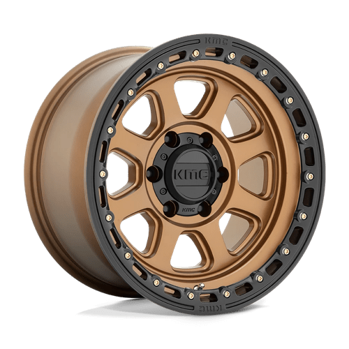https://assets.wheelpros.com/transform/21fc78f7-2663-4e99-b539-71cc504a8bbc/KMC-KM548-6LUG-17x9-ET-12-MATTE-BRONZE-W_-BLK-LIP-A1-png?size=500