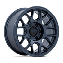 https://assets.wheelpros.com/transform/d50e31bd-00bc-4ec3-9135-ea13387b1715/KMC-KM730LX-HATCHET-17X8-5-6-ET-10-METALLIC-BLUE-A1-png?size=500