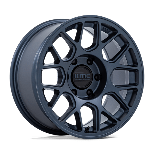 https://assets.wheelpros.com/transform/d50e31bd-00bc-4ec3-9135-ea13387b1715/KMC-KM730LX-HATCHET-17X8-5-6-ET-10-METALLIC-BLUE-A1-png?size=500
