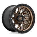 https://assets.wheelpros.com/transform/74f2019c-8028-4214-b5f2-4cd58901b26e/RUNNER-D777-15X10-4LUG-ET0-MATTE-BRONZE-N-MATTE-BLK-RING-A1-png?size=500