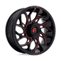 https://assets.wheelpros.com/transform/2a38f43f-4d09-431b-8a77-9501e9f40599/RUNNER-D779-UTV-18X7-4LUG-ET13-GLOSS-BLK-N-RED-MILLED-A1-png?size=500