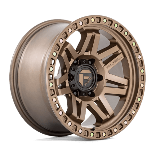 https://assets.wheelpros.com/transform/1dcdb068-7322-4ec2-84c3-1e9189356a7e/SYNDICATE-D811-17X9-6LUG-ET-12-MATTE-BRONZE-A1-png?size=500