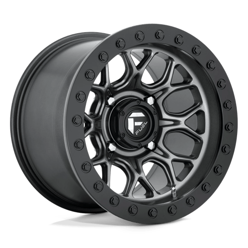 https://assets.wheelpros.com/transform/849e3476-1931-47c1-9c1c-585b97e3c5a9/TECH-D919-4LUG-15x10-ET0-ANTHRACITE-W-BLK-RING-A1-png?size=500