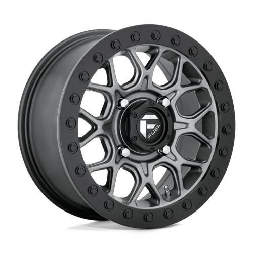 https://assets.wheelpros.com/transform/0aa53d95-c71d-4776-8600-6e459e739635/TECH-D919-4LUG-15x7-ET38-ANTHRACITE-W-BLK-RING-A1-png?size=500