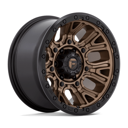 https://assets.wheelpros.com/transform/48f920ed-b7ce-4221-adba-6b4009500dd3/TRACTION-D826-17X9-6LUG-ET-12-MATTE-BRONZE-W-BLACK-RING-A1-png?size=500