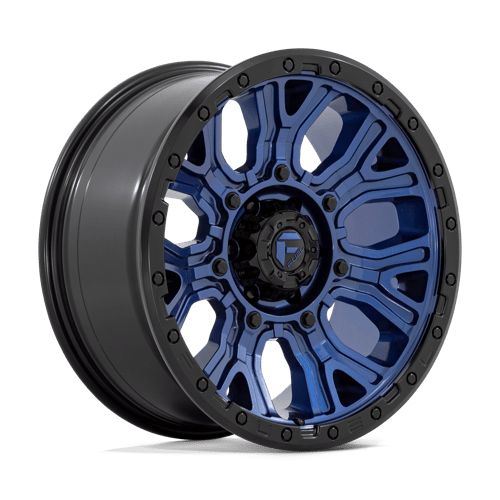 https://assets.wheelpros.com/transform/71853f0a-c7dc-47f7-8e67-6f99f98aa328/TRACTION-D827-20X9-6LUG-ET1-DARK-BLUE-W-BLACK-RING-A1-png?size=500