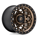 https://assets.wheelpros.com/transform/76d8c7d0-208f-4e9d-a1c4-fedb2dcdc5df/UNIT-D785-15X10-4LUG-0MM-MATTE-BRONZE-N-BLK-RING-A1-png?size=500